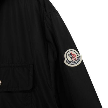 Moncler black windbreaker jacket full zip nylon with logo detail and excellent condition.