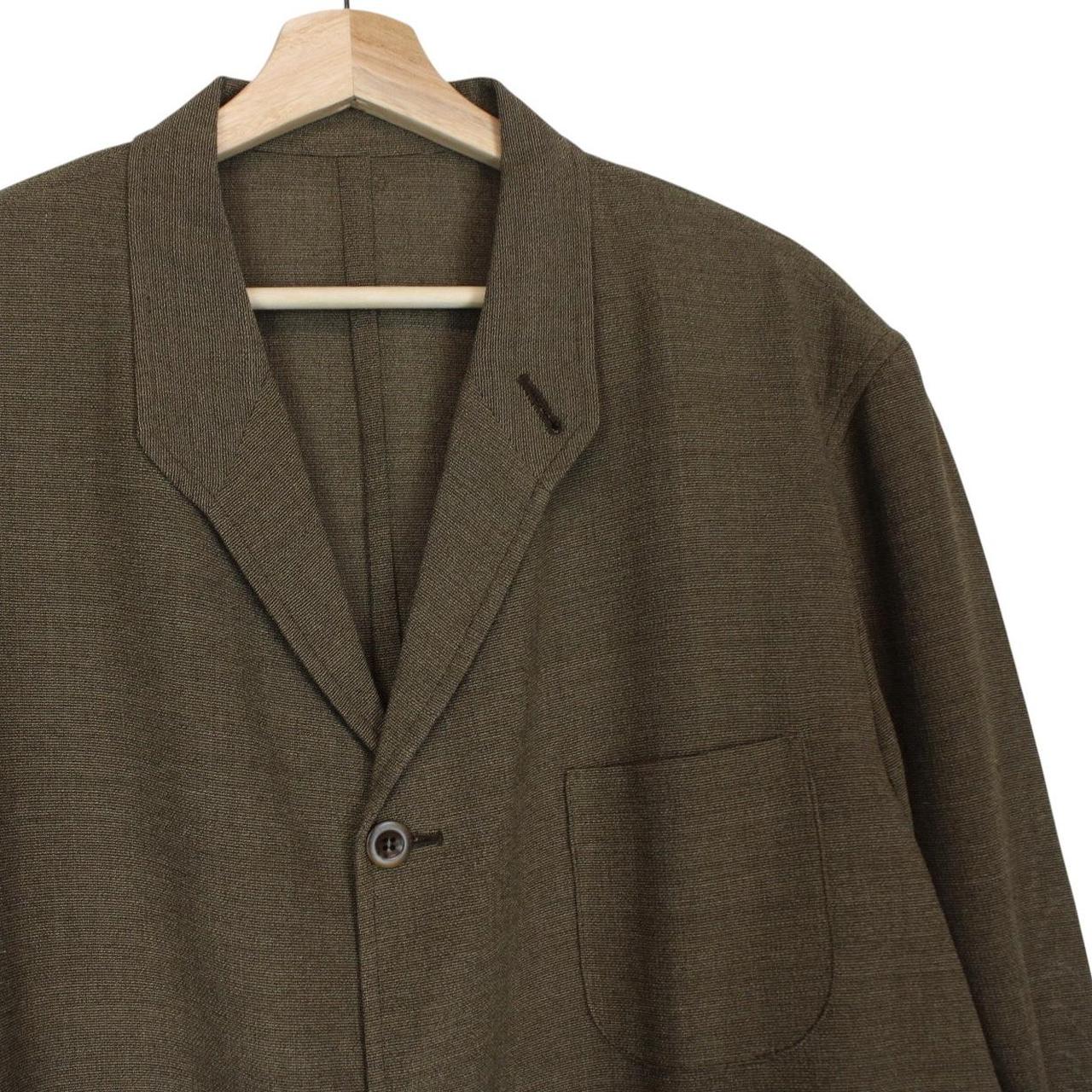 Burberry khaki brown blazer jacket with classic check lining and logo detail.
