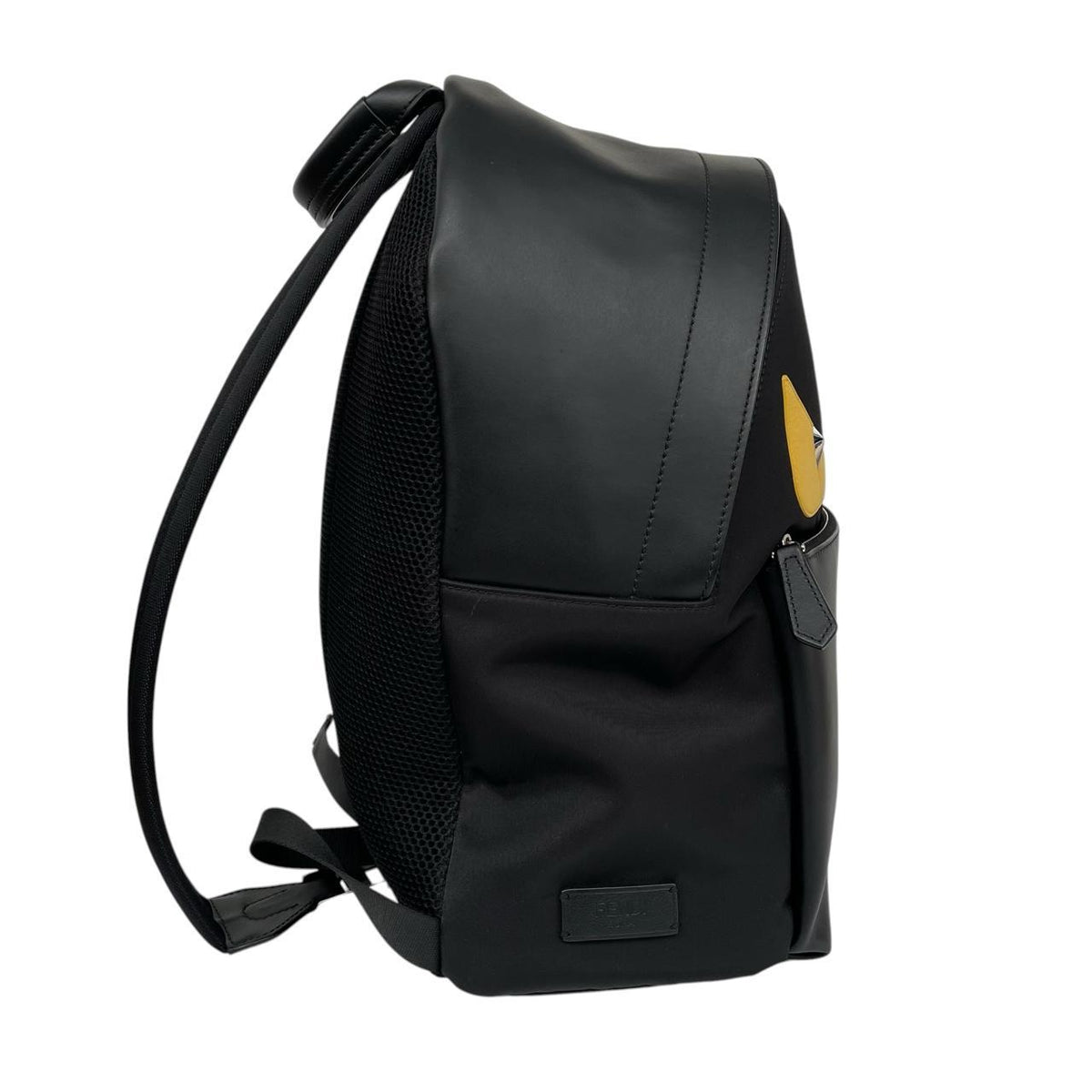 Fendi black and yellow nylon/leather backpack with monster bug eyes design.