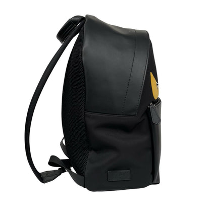 Fendi black and yellow nylon/leather backpack with monster bug eyes design.