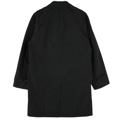 Burberry black Balmacaan coat with Nova Check lining and logo detail.