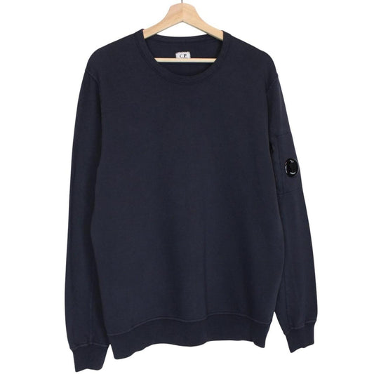 CP Company navy blue cotton sweatshirt with goggle lens detail and logo.