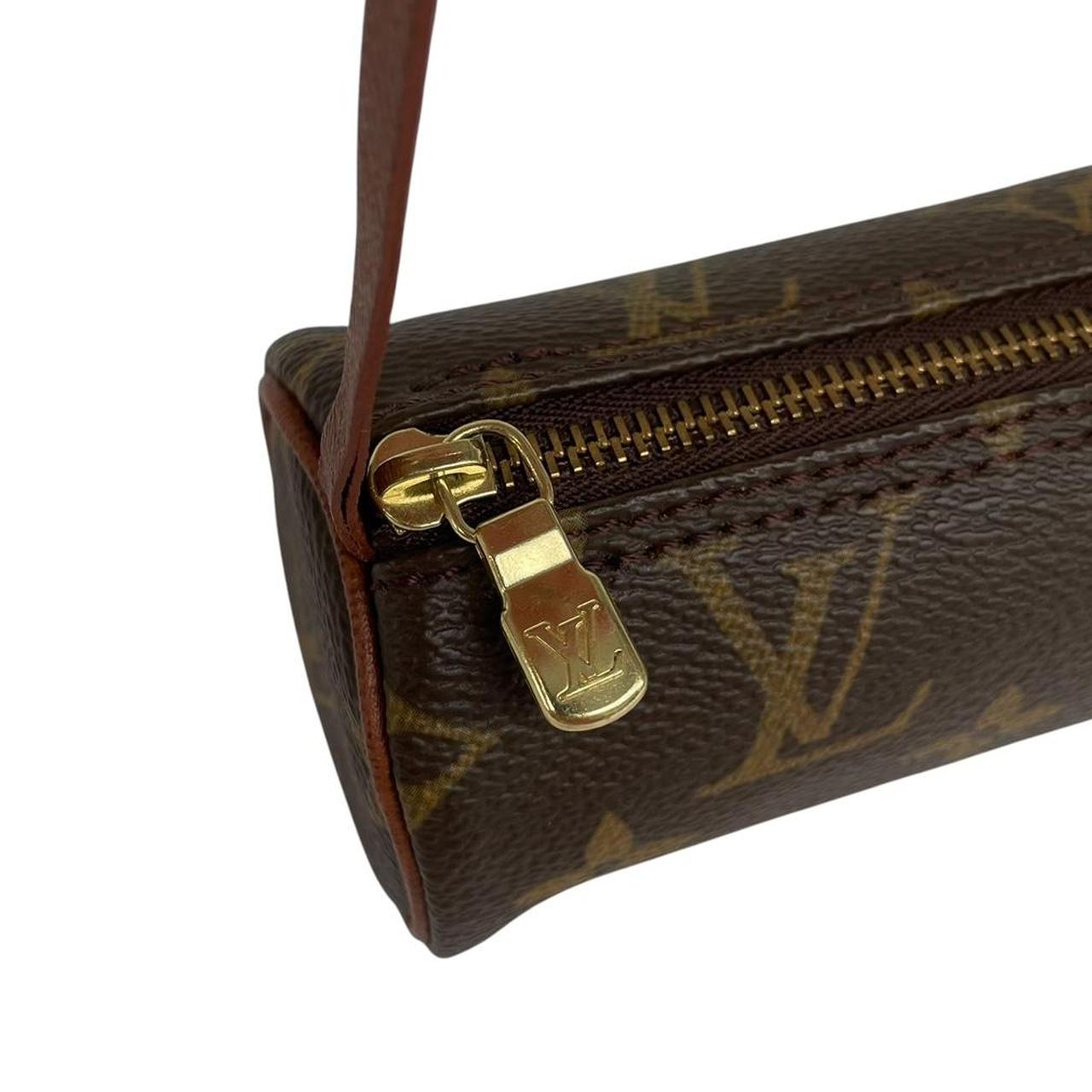 Louis Vuitton brown and tan duffel bag with monogram canvas and logo details.