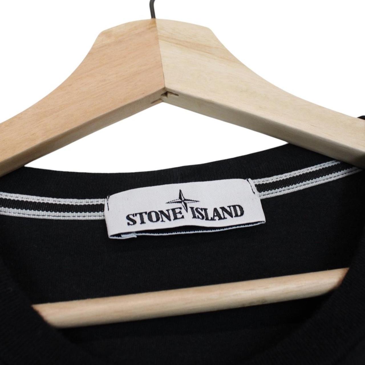 Stone Island black short sleeve cotton t-shirt with logo print and pocket detail.