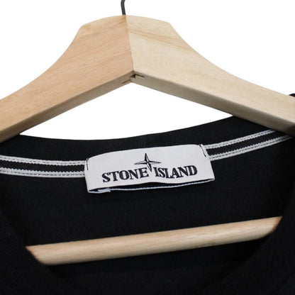 Stone Island black short sleeve cotton t-shirt with logo print and pocket detail.