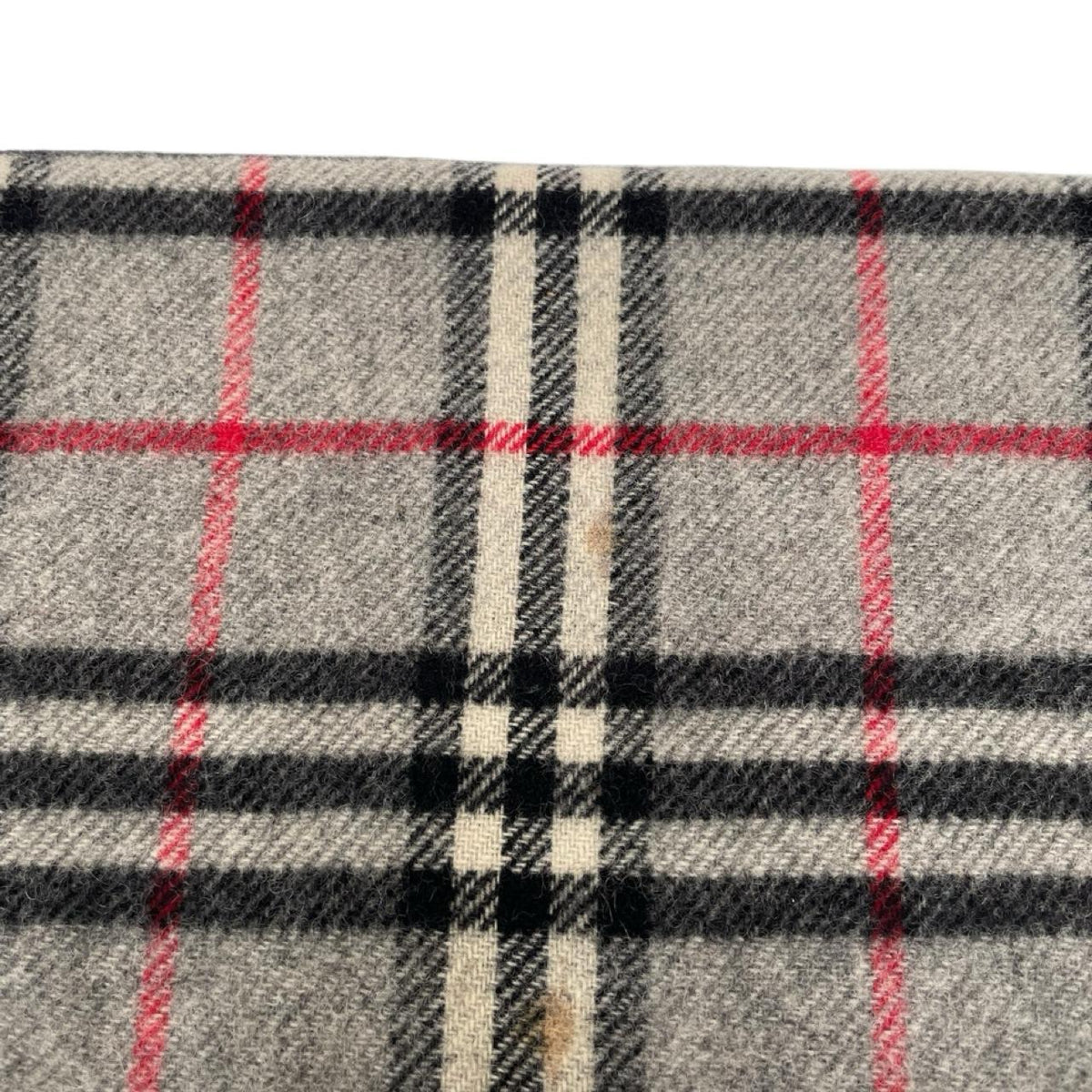 Burberry grey lambswool scarf featuring classic Nova Check pattern and logo.