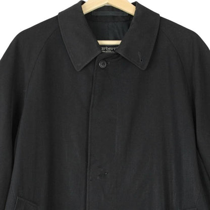 Burberry navy blue wool trench coat with single breasted design and classic logo.