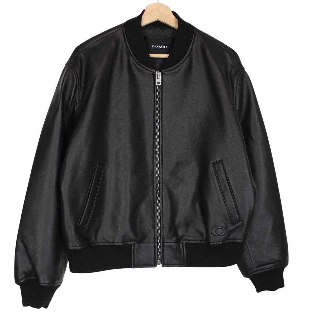 Coach black lamb leather bomber jacket with full zip and brand logo.