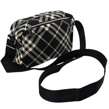Burberry black and white EKD check canvas duffel bag with logo detail.