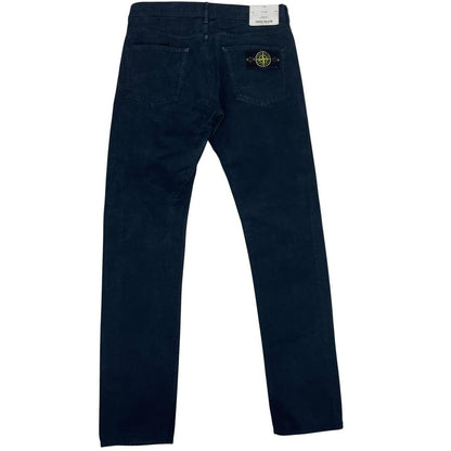 Stone Island navy blue slim fit cotton trousers with logo patch and side pockets.