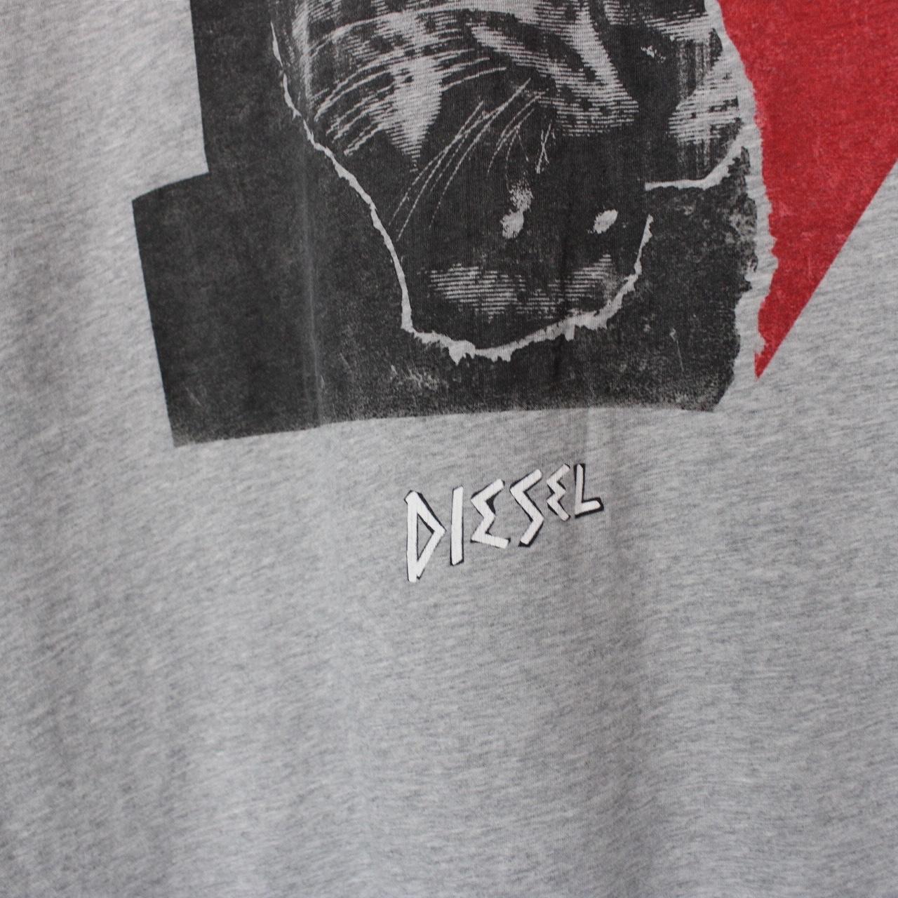 Diesel grey short sleeve cotton t-shirt with jaguar print and pocket detail.