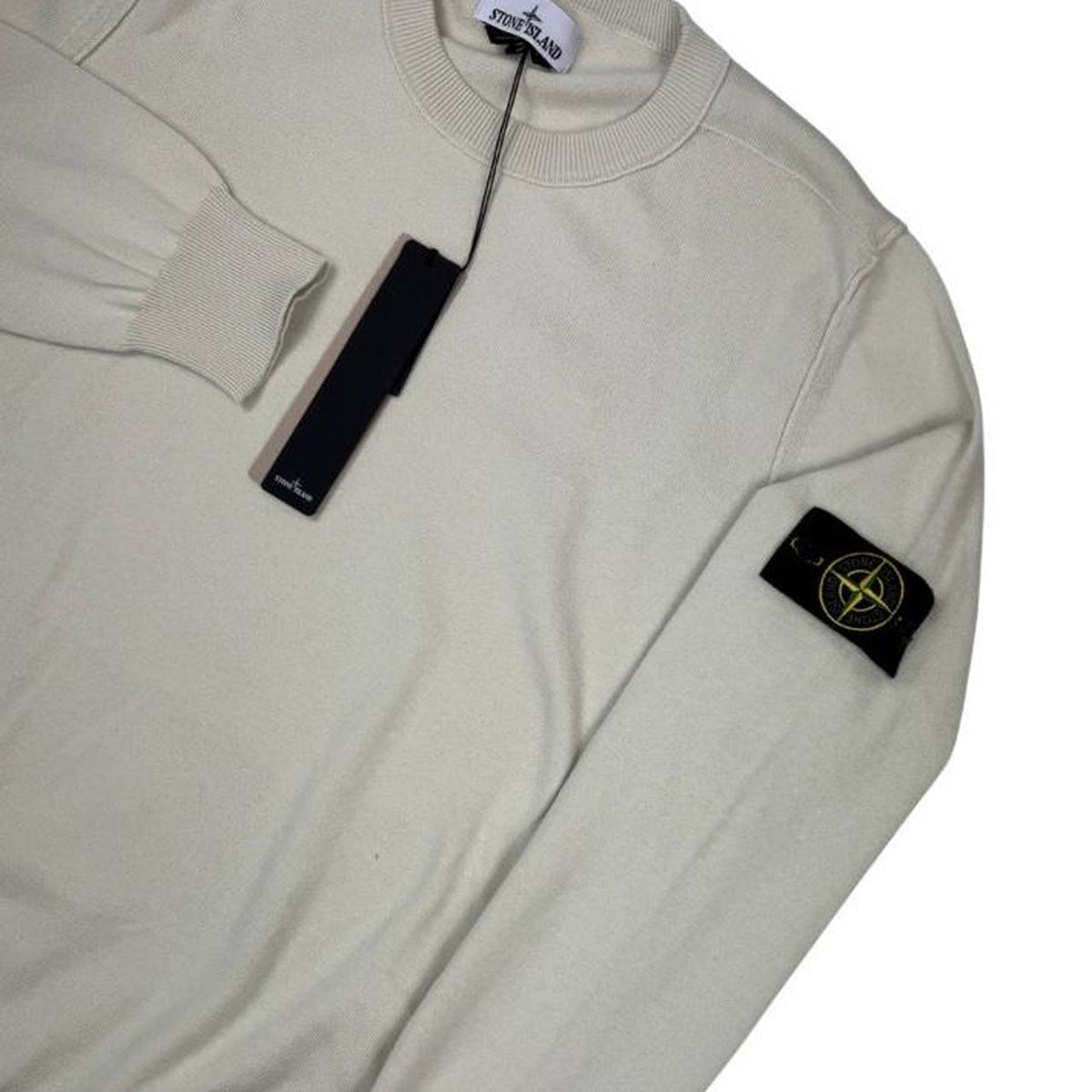 Stone Island beige knit jumper made from organic cotton with logo badge detail.