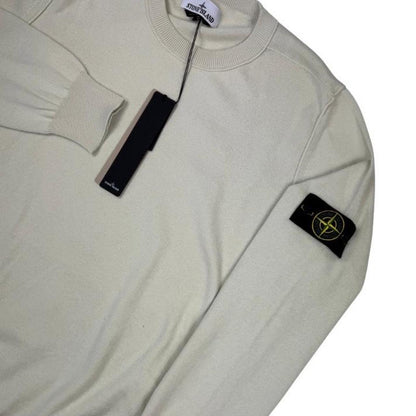 Stone Island beige knit jumper made from organic cotton with logo badge detail.