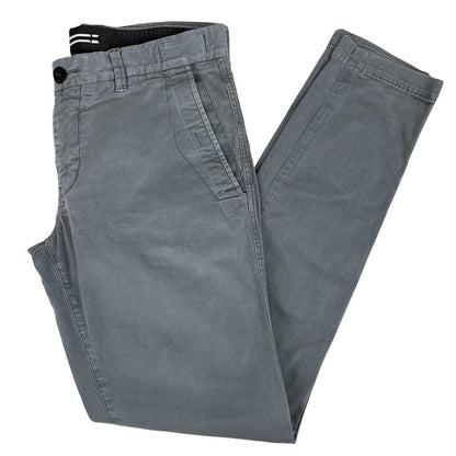 Stone Island grey slim fit cotton trousers with logo patch and classic design.