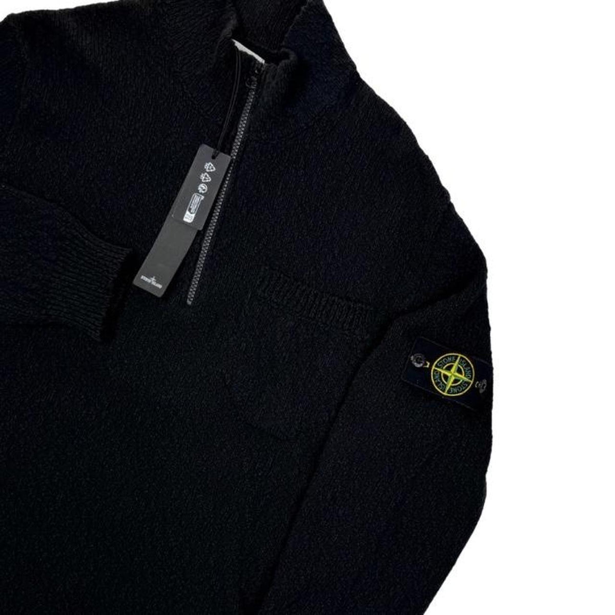 Stone Island black knit jumper with logo patch and cotton-linen blend material.