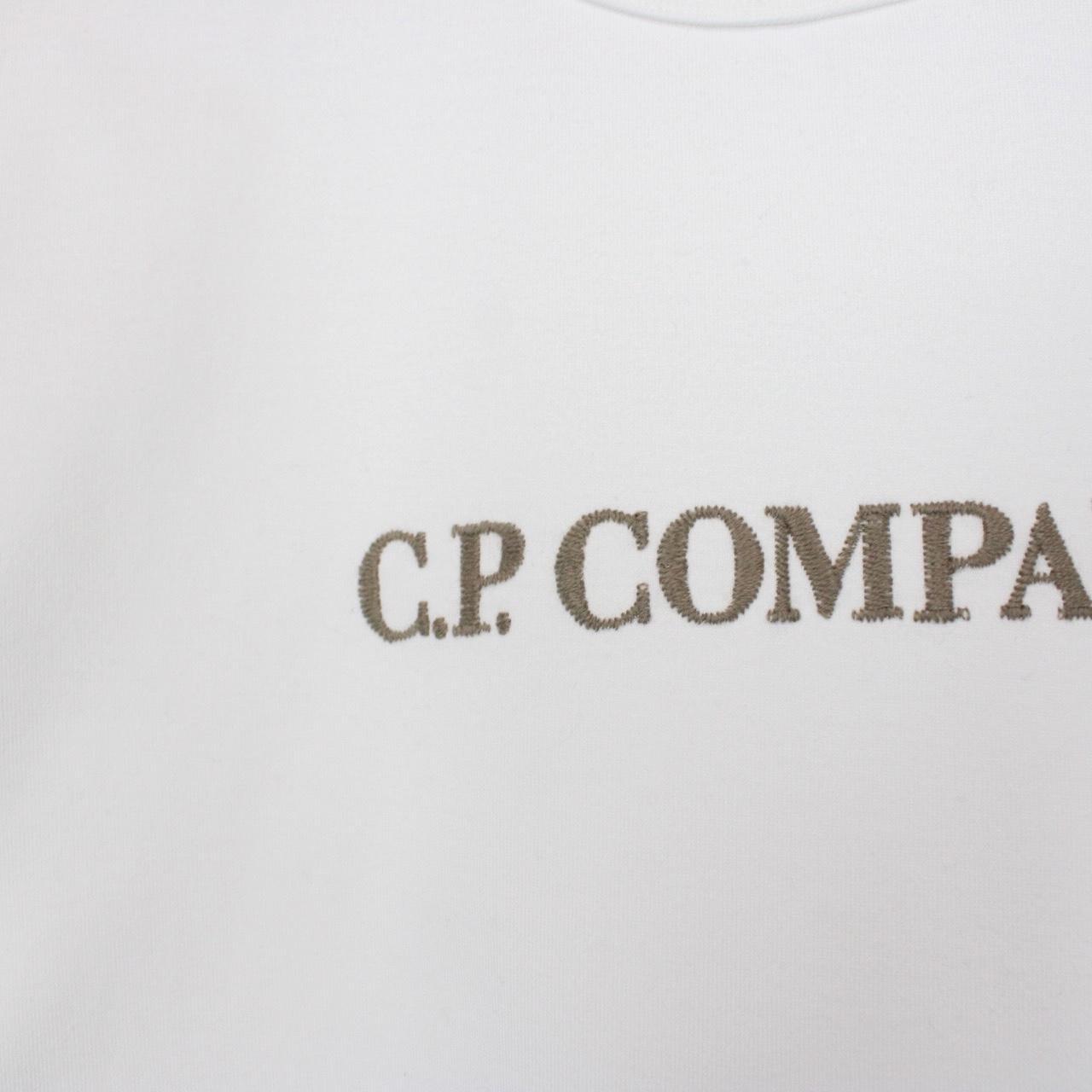 CP Company white pocket t-shirt with embroidered logo and mercerized cotton fabric.