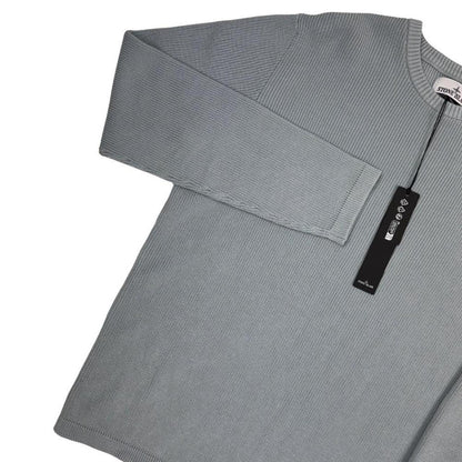 Stone Island grey waffle knit jumper with logo patch and organic cotton material.