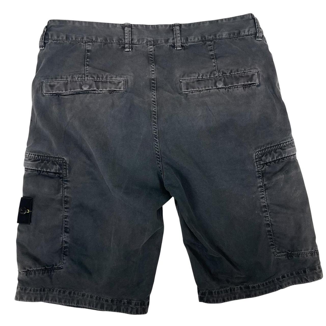 Stone Island navy blue cotton cargo shorts with logo patch and side pockets.