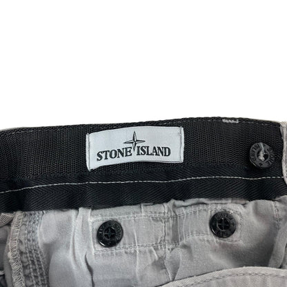 Stone Island grey slim fit cargo trousers with logo patch and repaired back pockets.