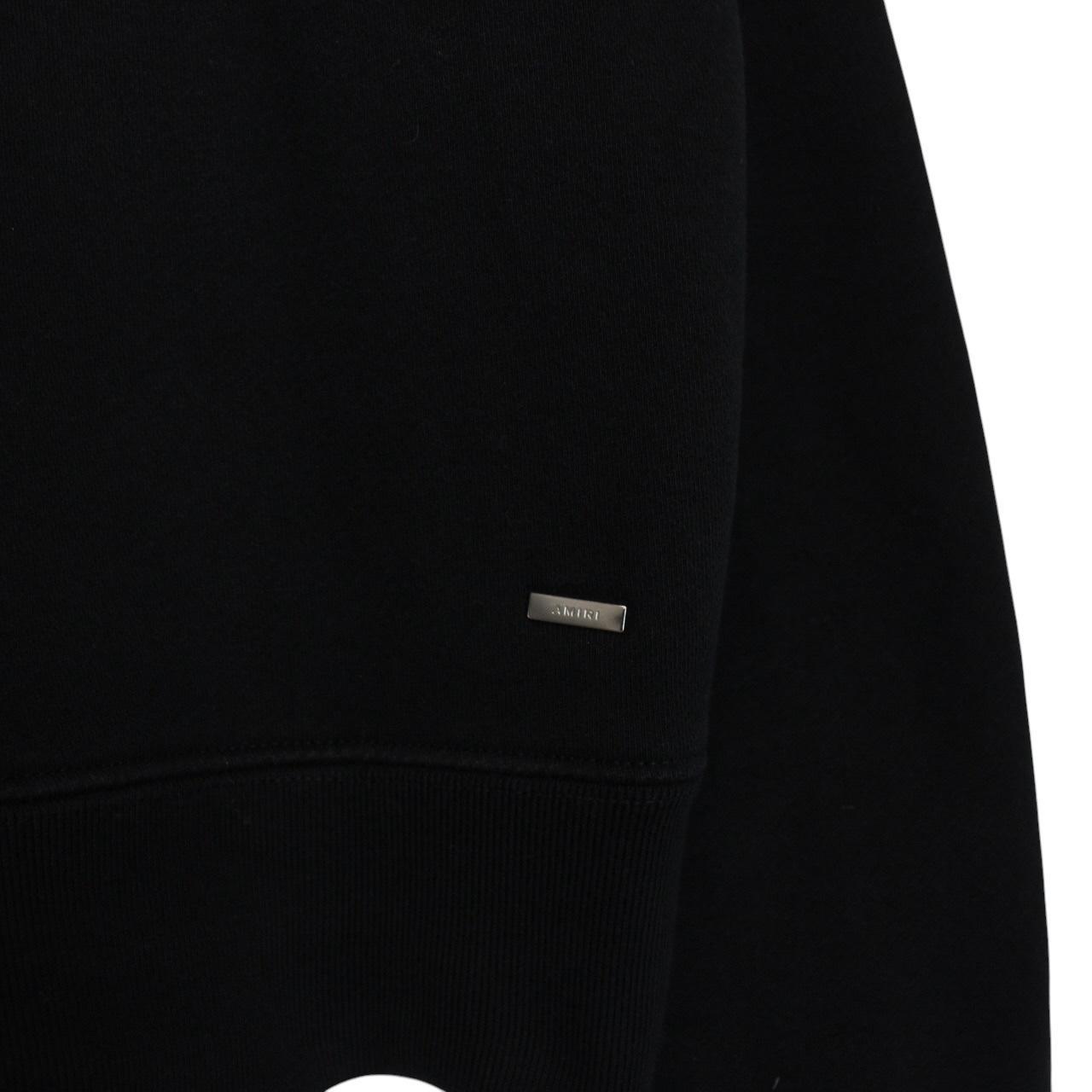 AMIRI black hoodie with rhinestone embellishments and crystal stick poke details.