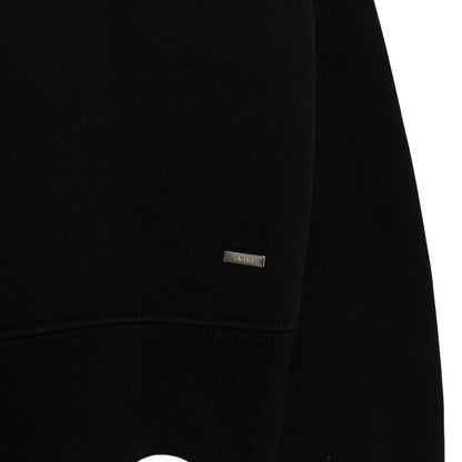 AMIRI black hoodie with rhinestone embellishments and crystal stick poke details.