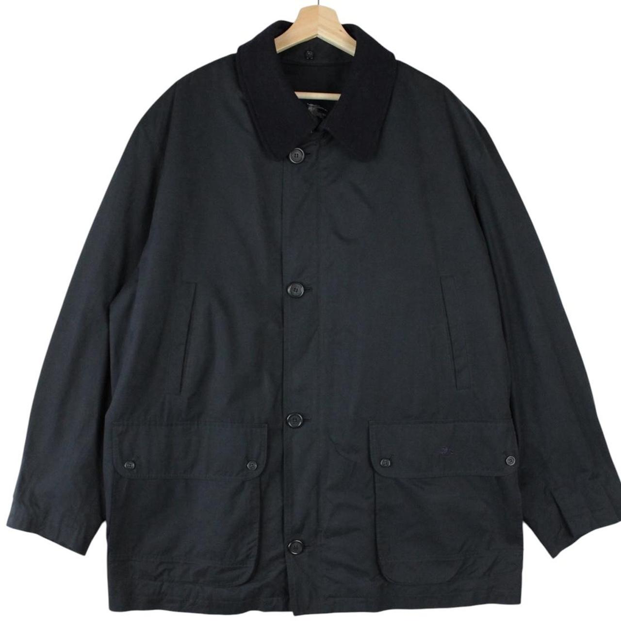 Burberry navy blue wool coat with Nova Check lining and logo detail.