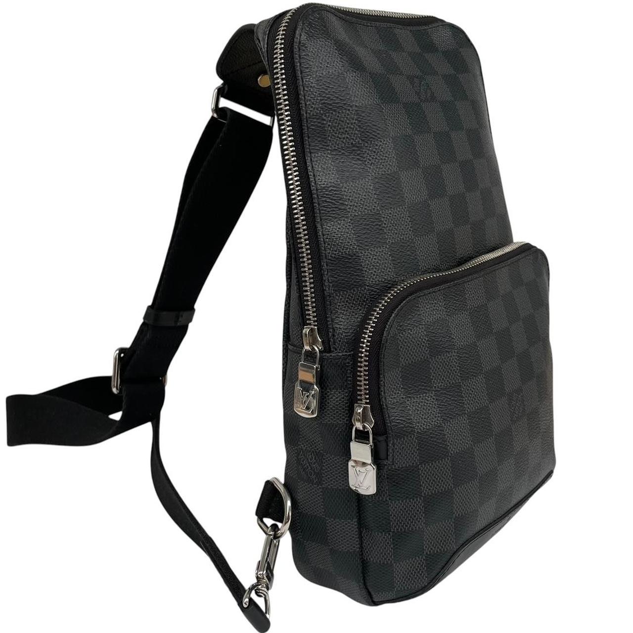 Louis Vuitton duffel bag graphite damier canvas with logo and light signs of use.