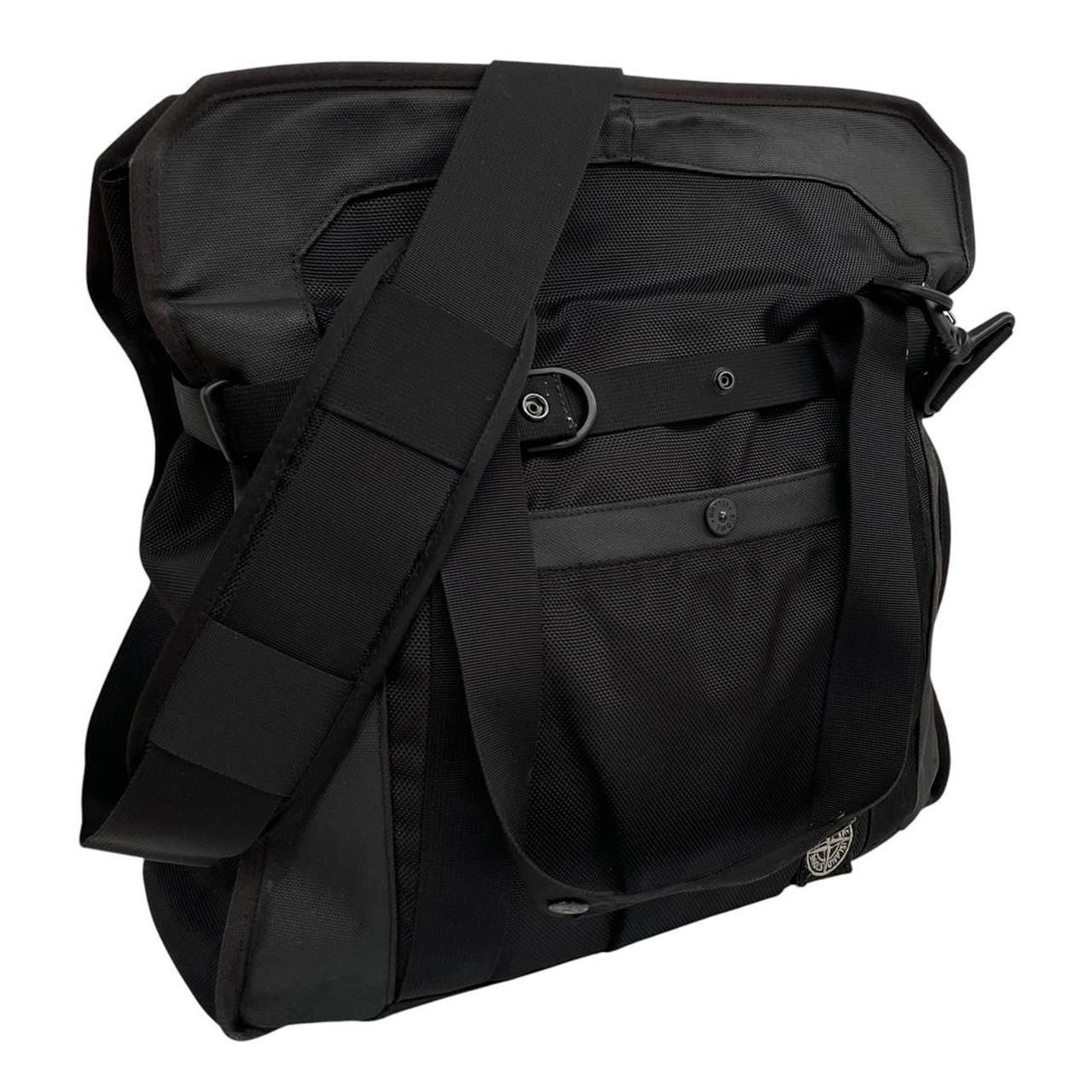 Stone Island black nylon tote bag with logo patch and crossbody strap.