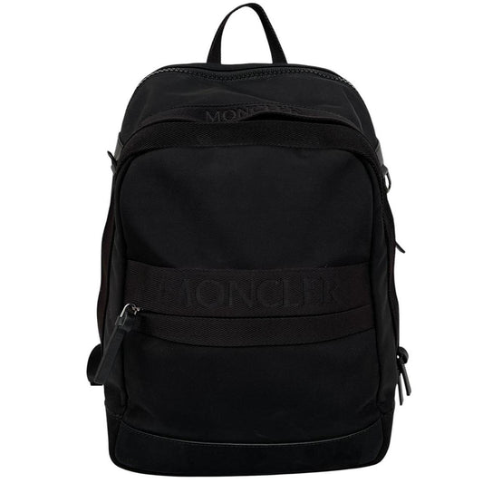 Moncler black duffel bag with logo patch and durable material, pre-loved condition.