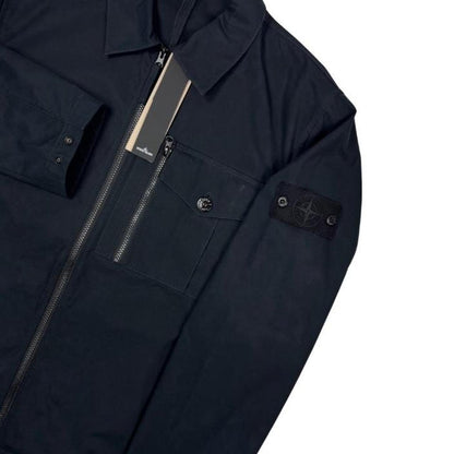 Stone Island navy blue waterproof overshirt jacket with ghost logo and cotton material.