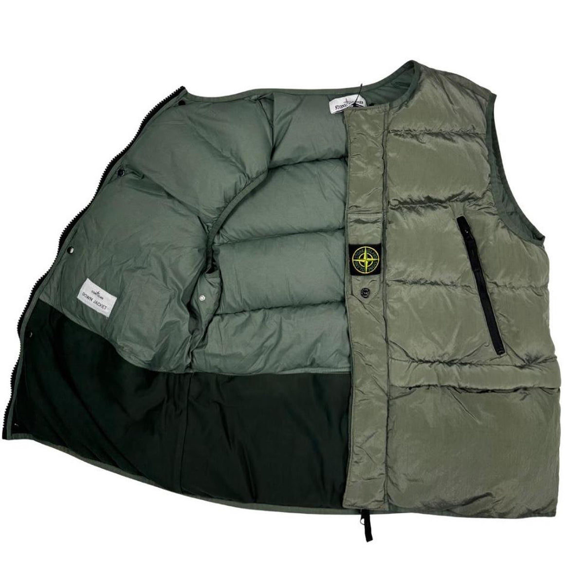 Stone Island black quilted gilet with Gore-Tex logo and ripstop material.
