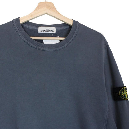 Stone Island navy blue cotton sweatshirt with embroidered logo and ribbed cuffs.
