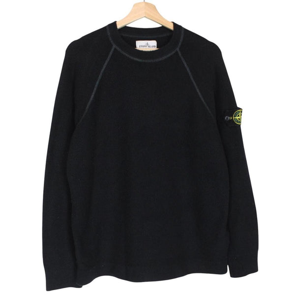 Stone Island black knit jumper with logo badge and cotton/nylon blend material.