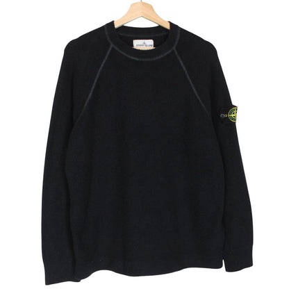Stone Island black knit jumper with logo badge and cotton/nylon blend material.