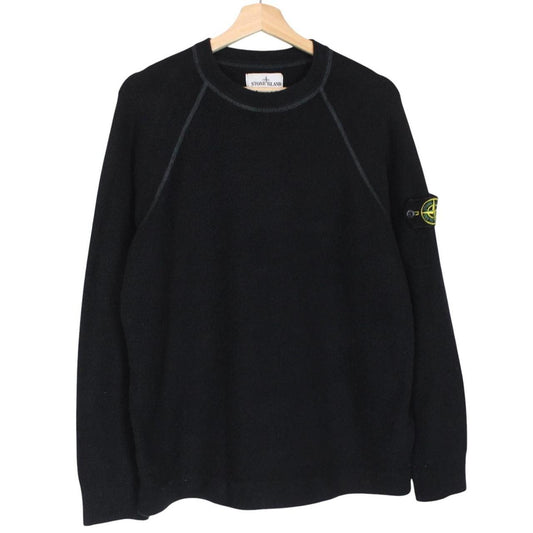 Stone Island black knit jumper with logo badge and cotton/nylon blend material.