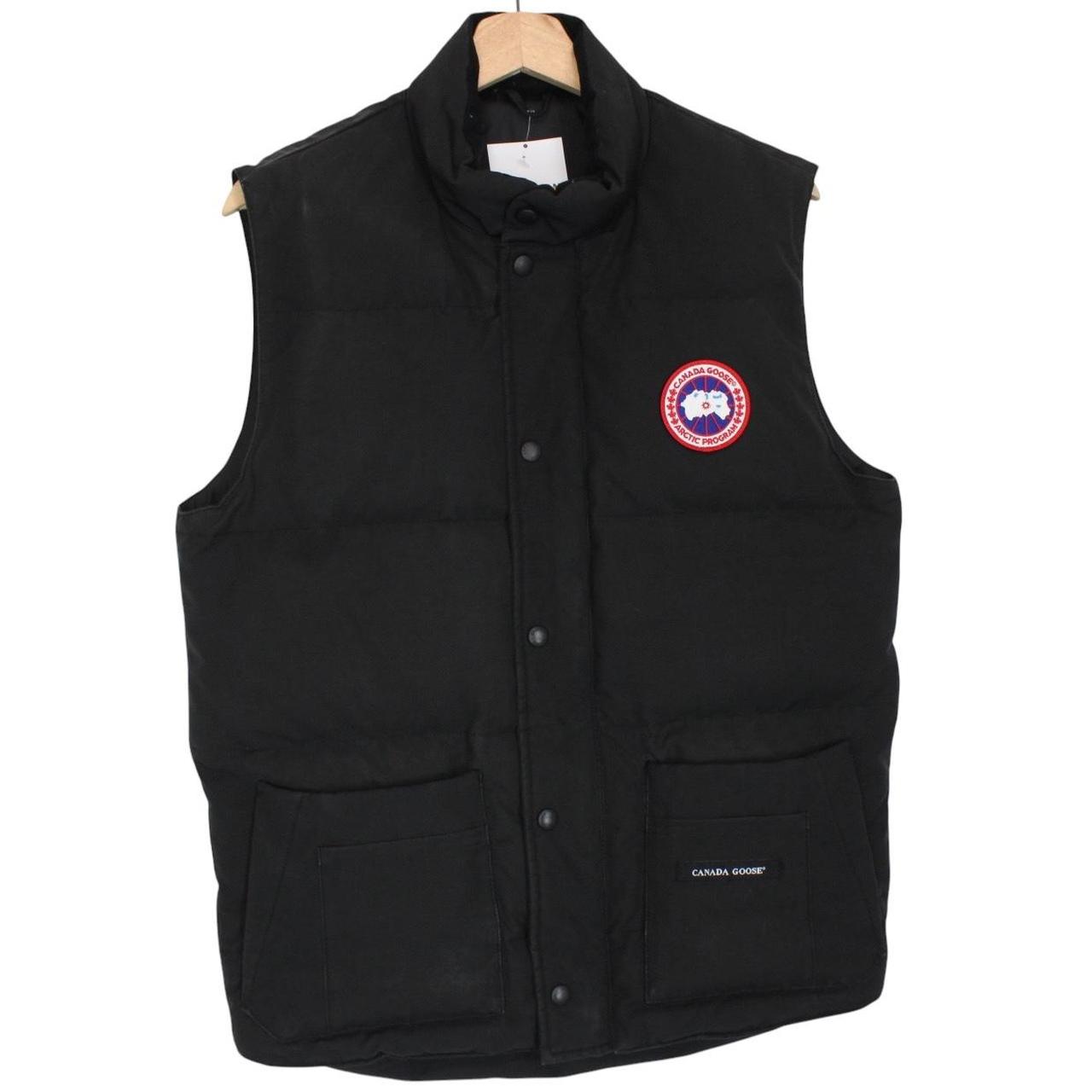 Canada Goose black down gilet with logo patch and original tags, very good condition.