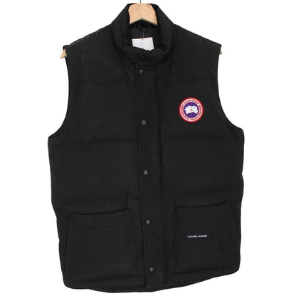 Canada Goose black down gilet with logo patch and original tags, very good condition.