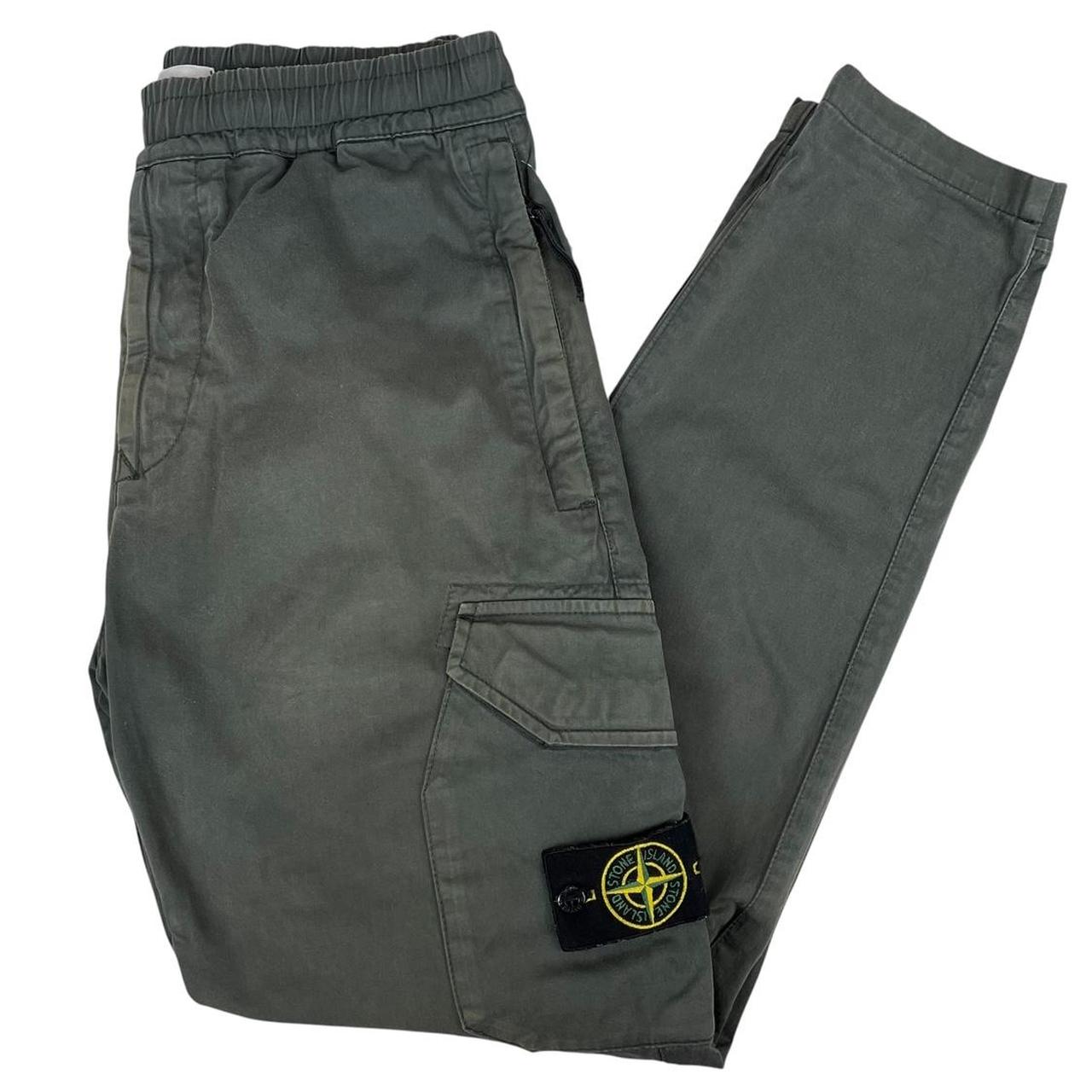 Stone Island grey cargo trousers with logo patch and pockets, visible discolouration.