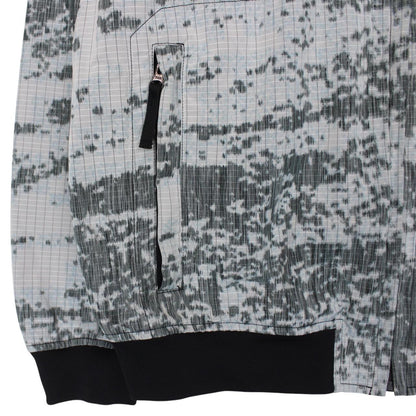 Stone Island bomber jacket grey marl with embroidered compass logo and unique pattern.