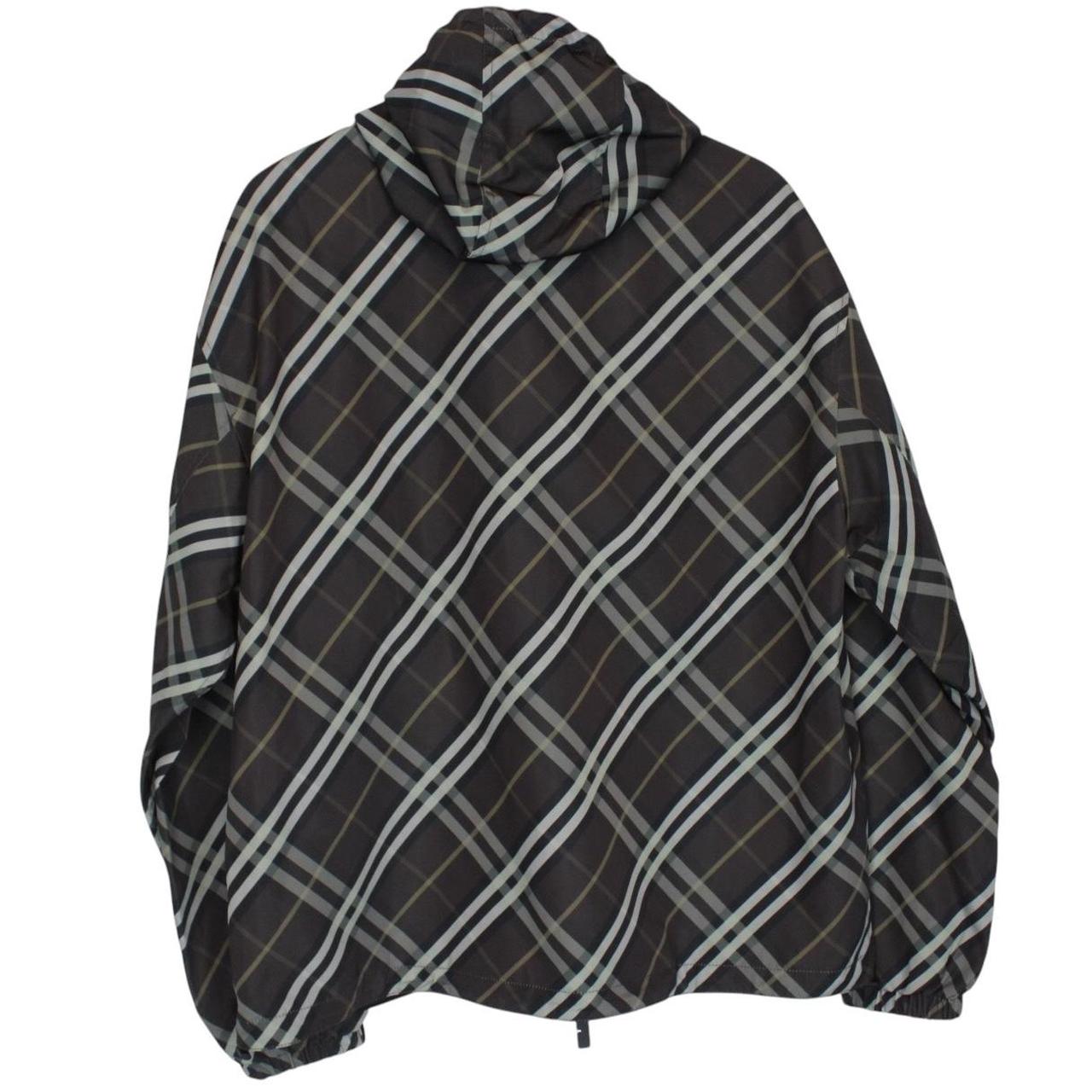 Burberry reversible jacket in dark grey and black with Nova Check pattern and full zip.