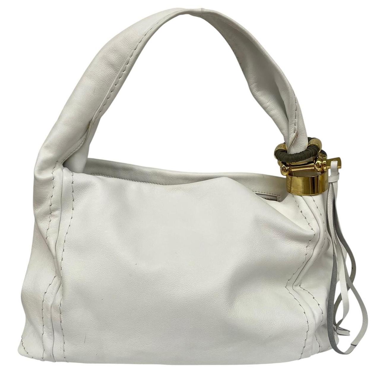 Jimmy Choo white leather hobo bag with subtle marks and logo detail.