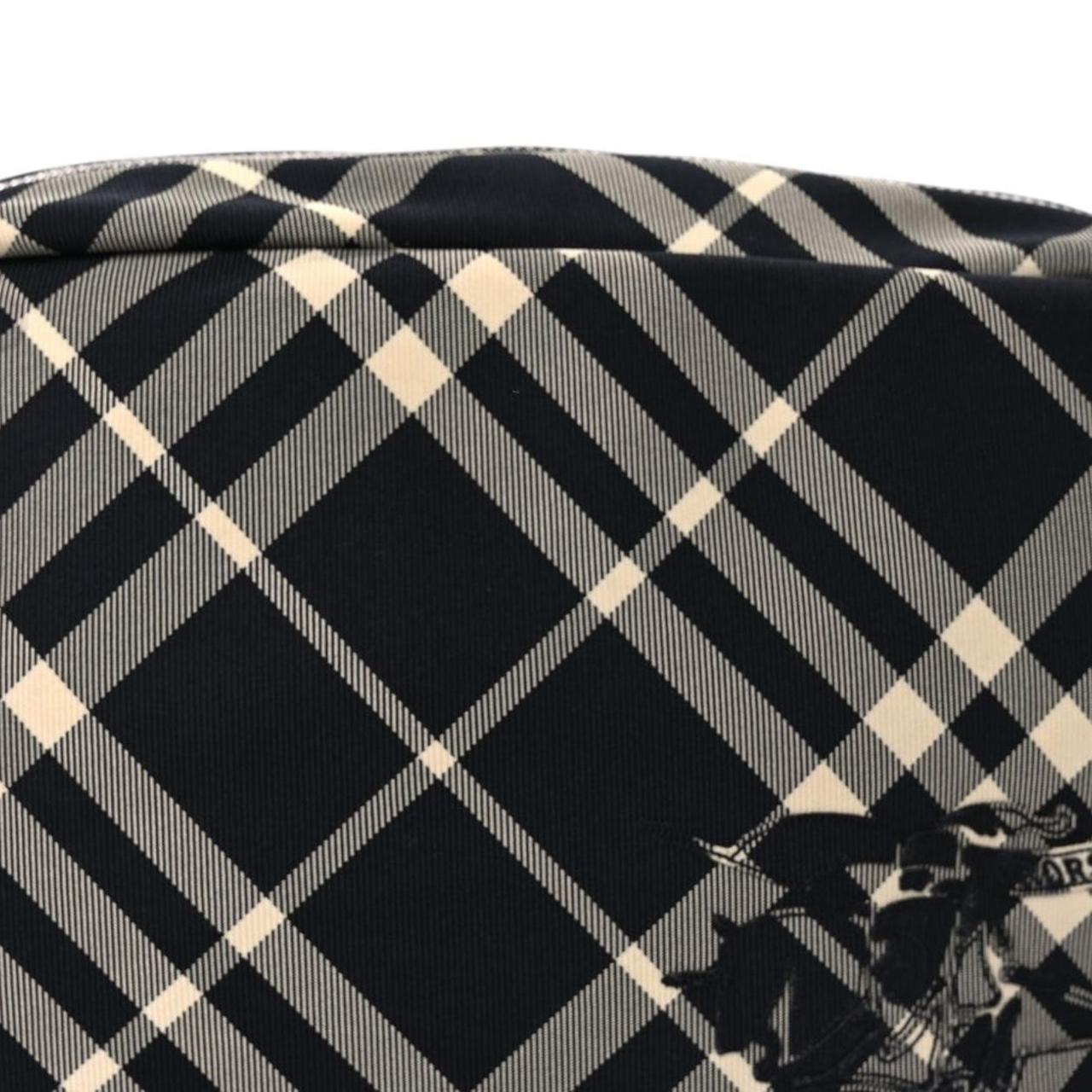 Burberry black and white EKD check canvas duffel bag with logo detail.