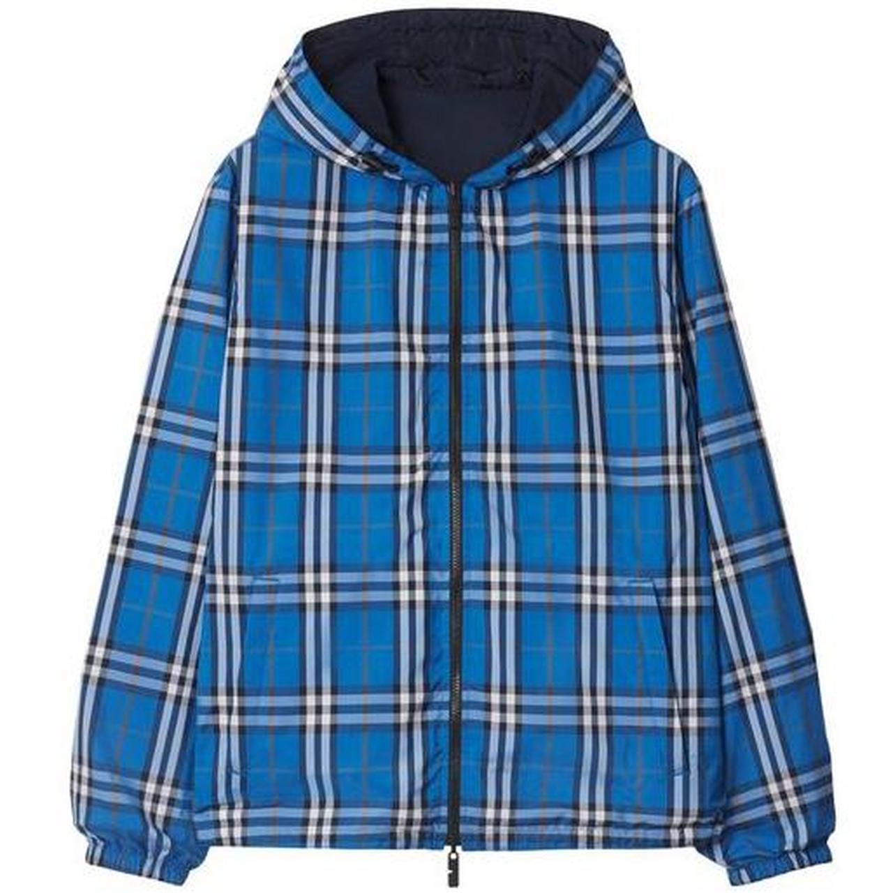 Burberry reversible windbreaker jacket in blue and black with Nova Check pattern.
