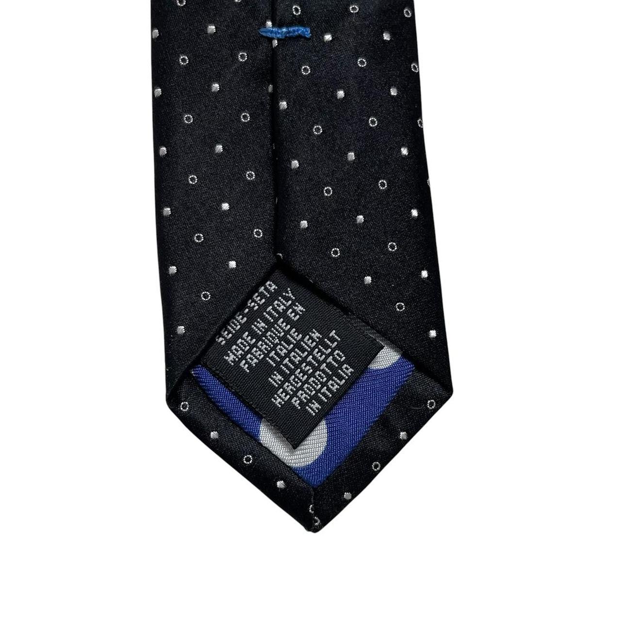 Paul Smith black and white polka dot silk tie with logo and tags attached.