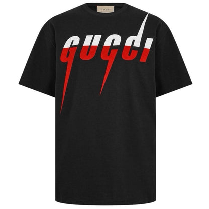 Black and red designer item with tags, featuring a logo and premium material.