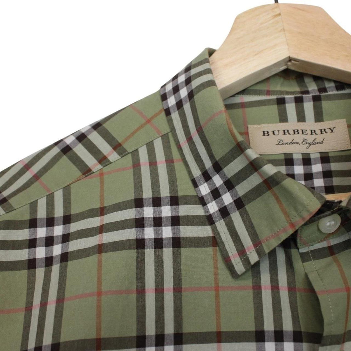 Burberry green long sleeve shirt with Nova Check pattern and cotton poplin material.