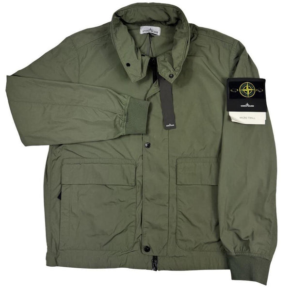 Stone Island green full zip micro twill jacket with removable woven brand patch.