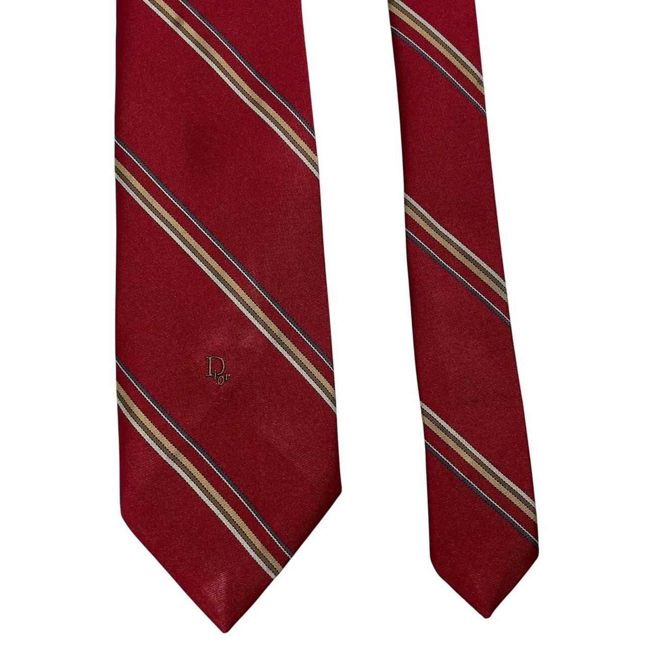 Christian Dior red striped polyester tie with vintage logo and sleek design.