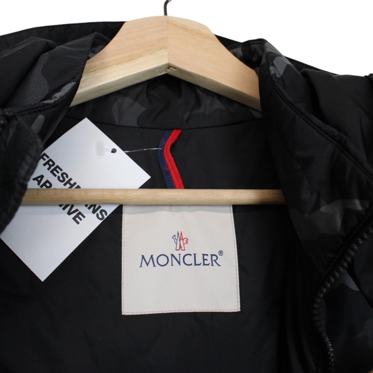 Moncler black and grey full zip down hooded gilet with logo and quilted design.