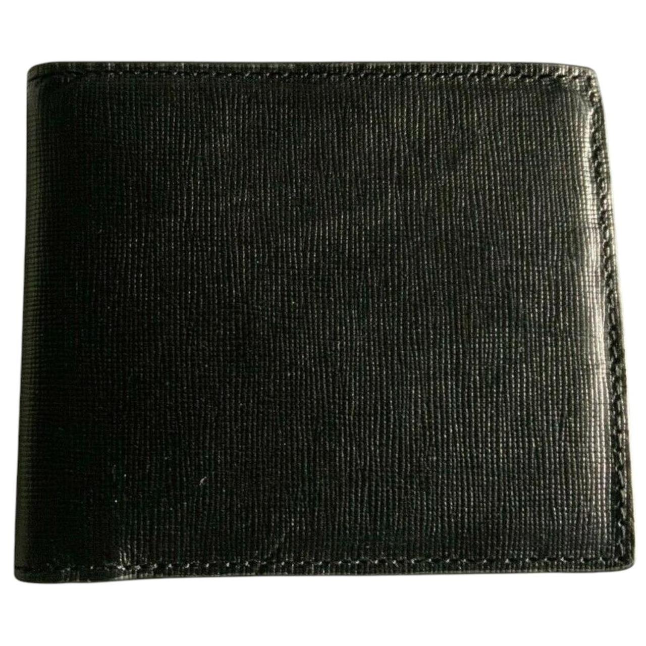 Paul Smith black bifold wallet textured crosshatch leather with logo detail.